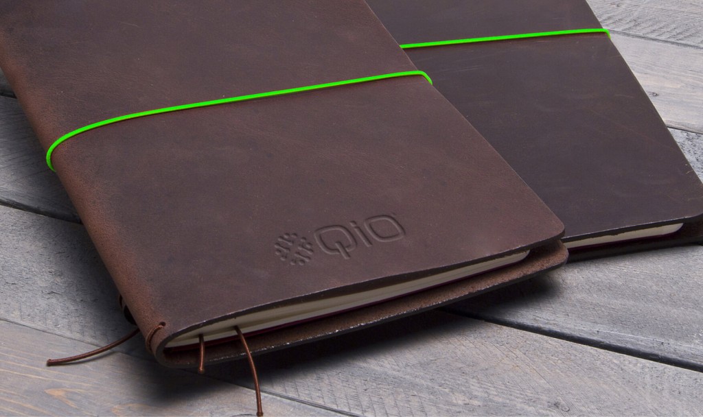 Aeron Case Study - QiO branded notebook